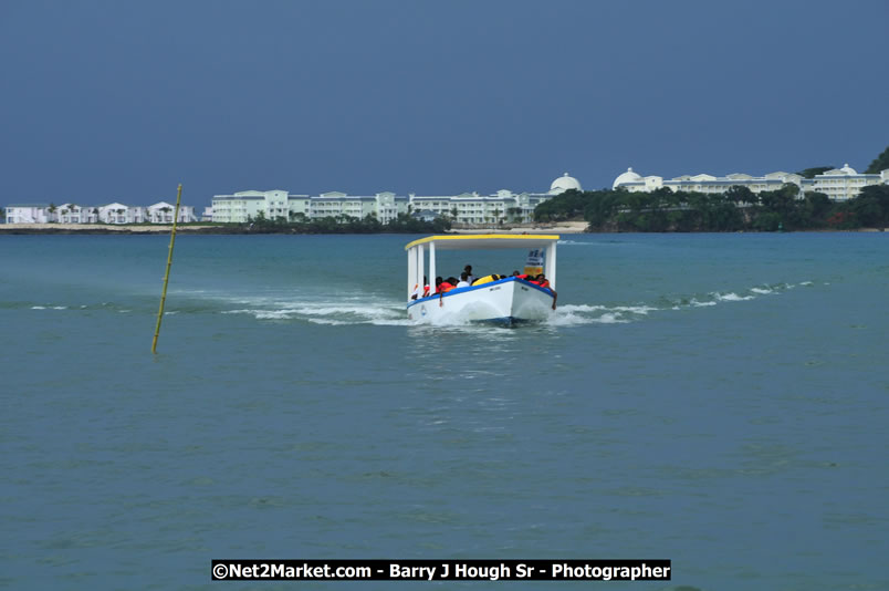 Lucea Cross the Harbour @ Lucea Car Park - All Day Event - Cross the Harbour Swim, Boat Rides, and Entertainment for the Family - Concert Featuring: Bushman, George Nooksl, Little Hero, Bushi One String, Dog Rice and many local Artists - Friday, August 1, 2008 - Lucea, Hanover Jamaica - Photographs by Net2Market.com - Barry J. Hough Sr. Photojournalist/Photograper - Photographs taken with a Nikon D300 - Negril Travel Guide, Negril Jamaica WI - http://www.negriltravelguide.com - info@negriltravelguide.com...!