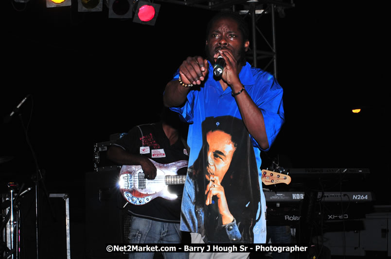 Lucea Cross the Harbour @ Lucea Car Park - All Day Event - Cross the Harbour Swim, Boat Rides, and Entertainment for the Family - Concert Featuring: Bushman, George Nooksl, Little Hero, Bushi One String, Dog Rice and many local Artists - Friday, August 1, 2008 - Lucea, Hanover Jamaica - Photographs by Net2Market.com - Barry J. Hough Sr. Photojournalist/Photograper - Photographs taken with a Nikon D300 - Negril Travel Guide, Negril Jamaica WI - http://www.negriltravelguide.com - info@negriltravelguide.com...!