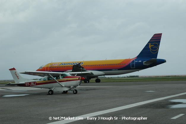 Air Jamaica Airline - Landing & Take Off - MBJ Airports Limited - Sangster International Airport - Domestic Terminal - Montego Bay, St James, Jamaica W.I. - MBJ Limited - Transforming Sangster International Airport into a world class facility - Photographs by Net2Market.com - Negril Travel Guide, Negril Jamaica WI - http://www.negriltravelguide.com - info@negriltravelguide.com...!