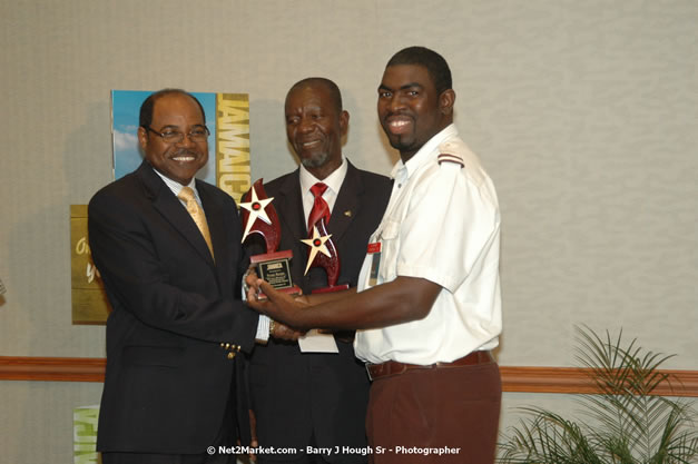 Red Cap Porters Awards - Minister of Tourism, Hon. Edmund Bartlett - Director of Tourism, Basil Smith - Friday, December 14, 2007 - Holiday Inn Sunspree, Montego Bay, Jamaica W.I. - Photographs by Net2Market.com - Barry J. Hough Sr, Photographer - Negril Travel Guide, Negril Jamaica WI - http://www.negriltravelguide.com - info@negriltravelguide.com...!