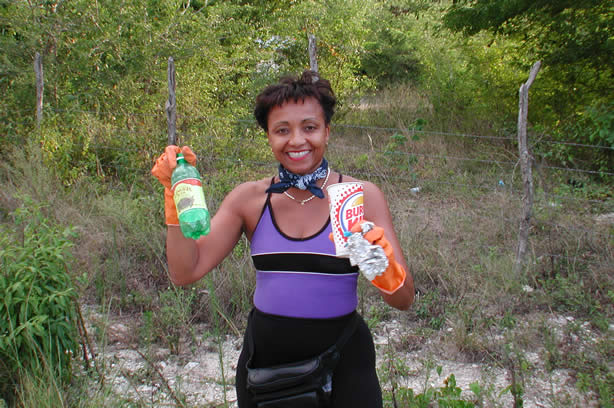 Volunteers Clean-Up Roadside Entrance to Negril - Negril Travel Guide